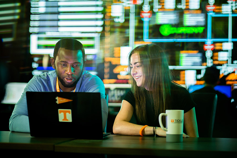 Students work in the Grid Visualization Lab inside the Min H. Kao Department of Electrical Engineering and Computer Scienceat the University of Tennessee, Knoxville.