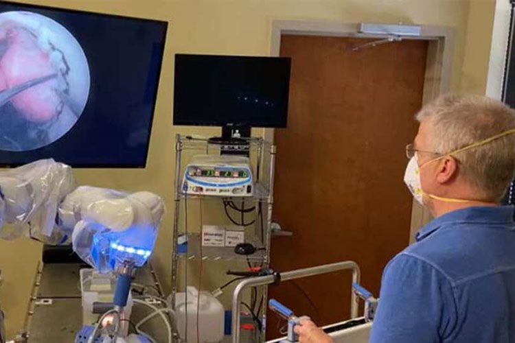 A surgical robot that is part of a Advanced Research Projects Agency for Health project.