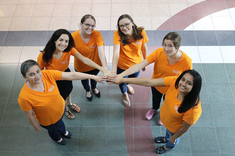 Michela Taufer, the Dongarra Professor in the Min H. Kao Department of Electrical Engineering and Computer Science (EECS) at the University of Tennessee, Knoxville and her Hih Performance Computing Group.