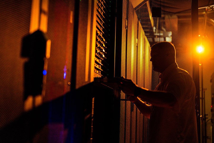 A technician pulls a server for inspection at a data center at the University of Tennessee.