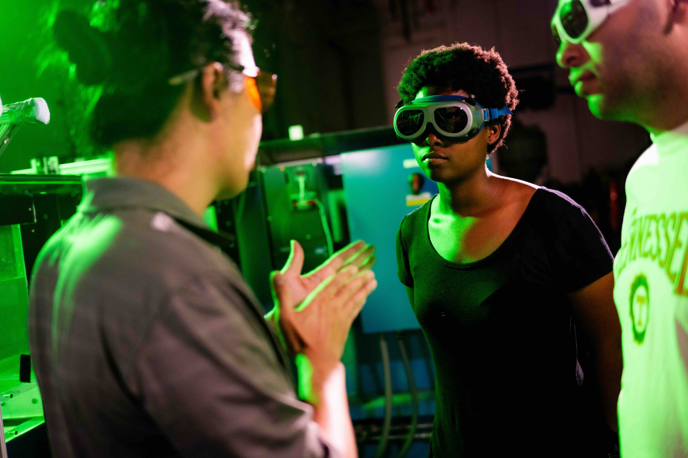 Assistant Professor Haochen Li and students Leila Kelly and Mohamed Shatarah use a flume to study and better predict aerodynamic performance of drones in the Water Infrastructure Lab on July 26, 2023. Photo by Jennie Andrews/University of Tennessee.