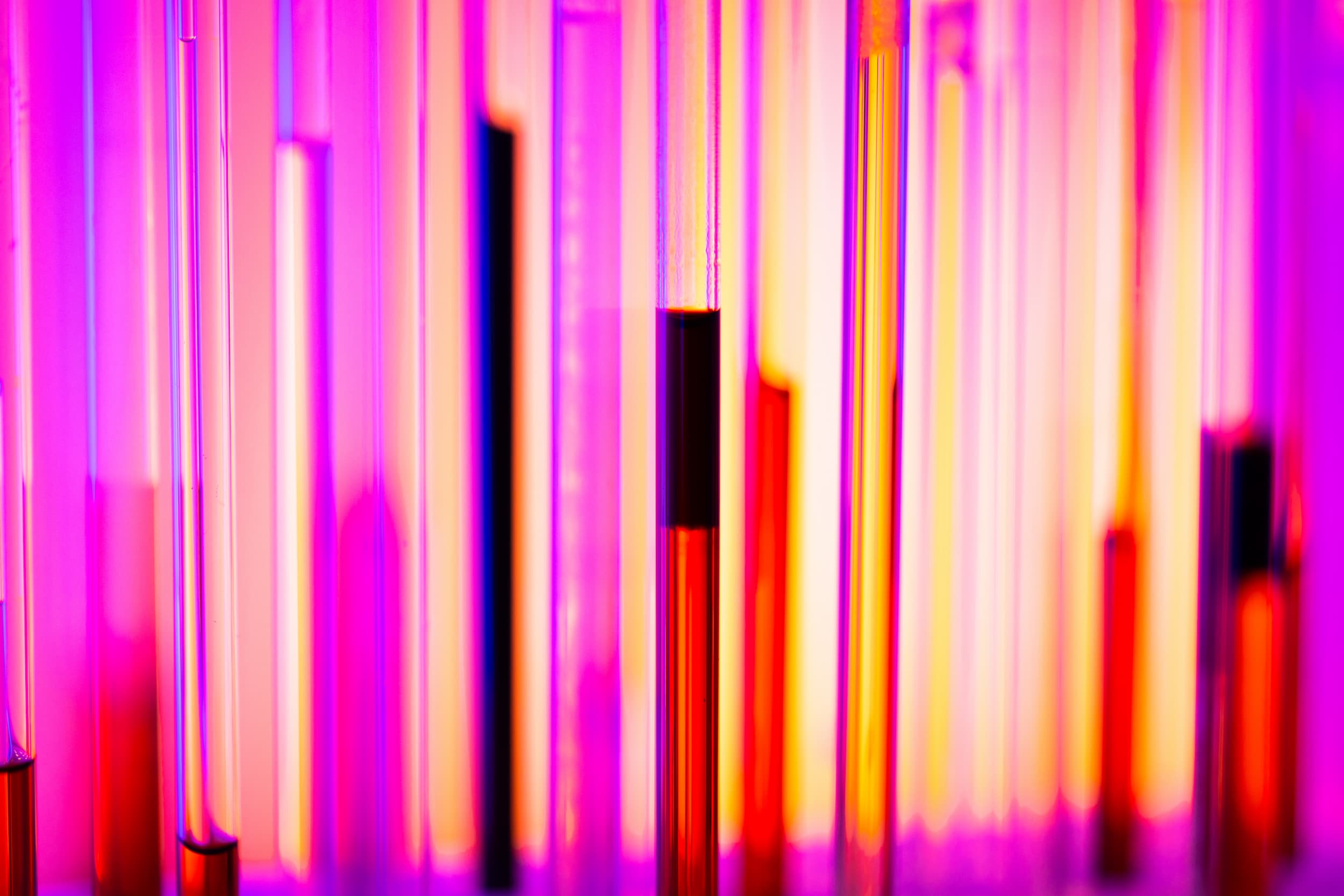 Detail of glass tubes holding color liquids in the Polymer Characterization Laboratory.