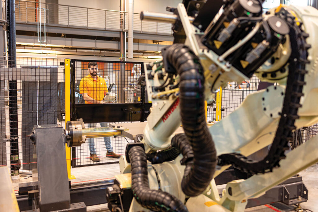 Researchers work in a lab in the Innovation South Facility.