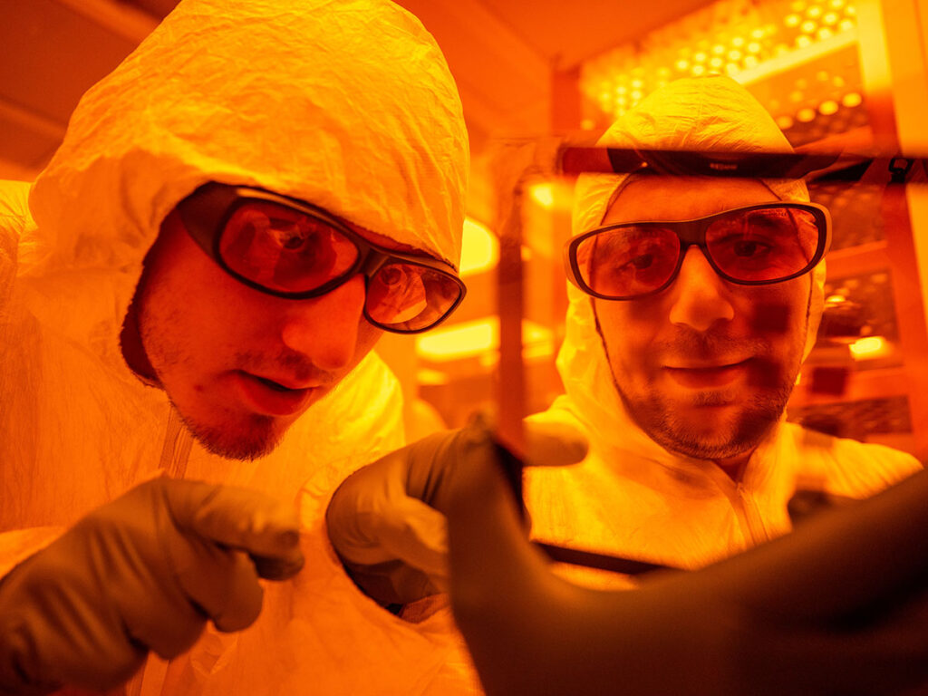 Post-Doctoral Researcher Amine Benkechkache and student Lance Drouet conduct research in a class 100 clean room at the Mirco-Processing Research Facility housed within UTís new Institute for Advanced Materials and Manufacturing located at Cherokee Farm