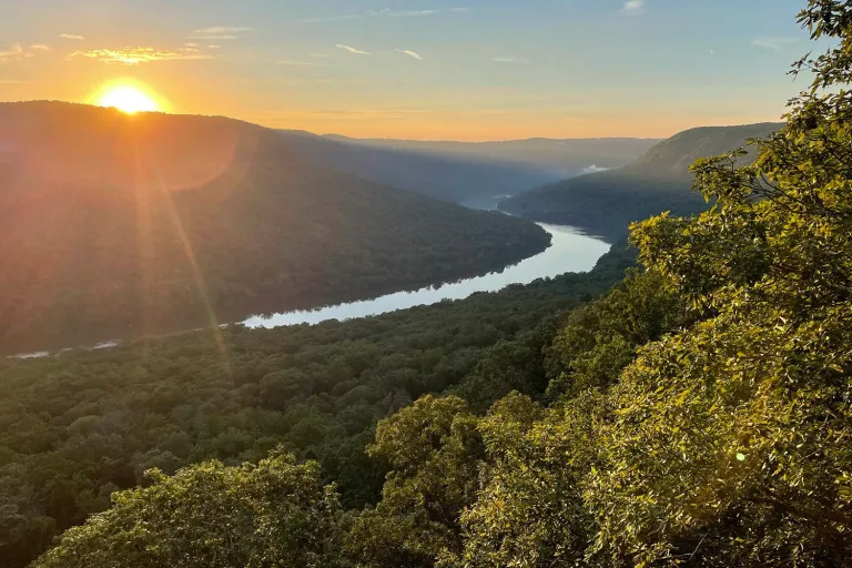 Birds-eye view of a river winding through the mountains in East Tennessee.