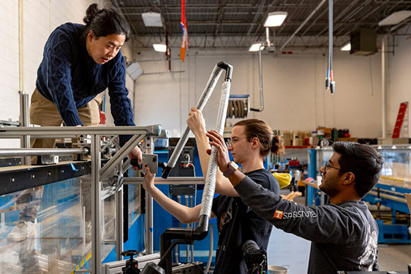 Researchers work in the Water Infrastructure Lab at UT.