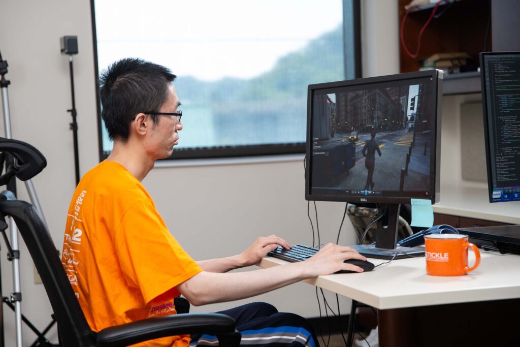 Songyang Liu runs a drone delivery computer simulation to test research.