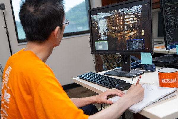 Using a simulator to test drone delivery for in the John D. Tickle Engineering Building at the University of Tennessee.