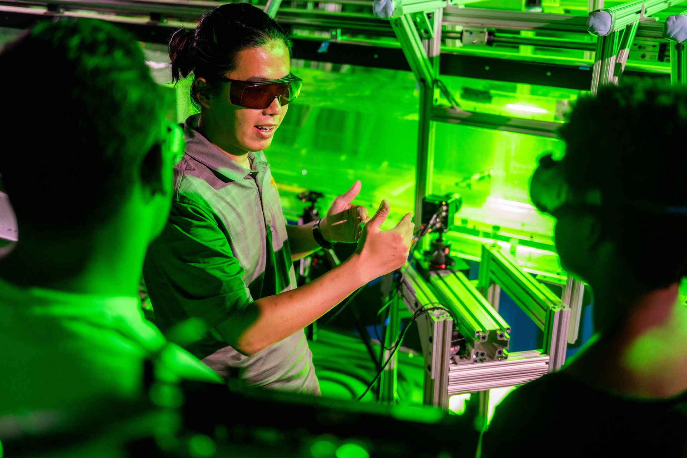 Haochen Li explains his research involving a drone inside a flume with moving water.