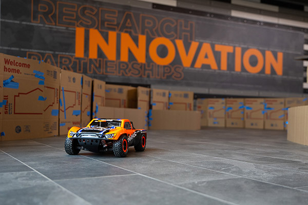 An autonomous car as it navigates a temporary track in the Zeanah Engineering Complex.