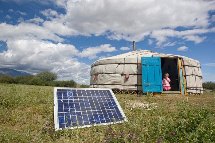 A family in Tarialan, Uvs Province, Mongolia, uses a solar panel to generate power for their ger, a traditional Mongolian tent. United Nations Photo
