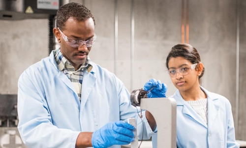 researchers in engineering lab
