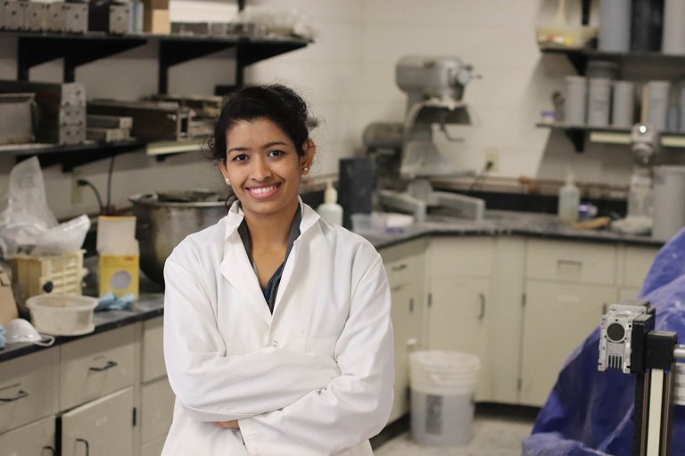 Debalina Ghosh, a civil engineering doctoral student in the Tickle College of Engineering, poses in the Civil and Environmental Engineering’s concrete lab.