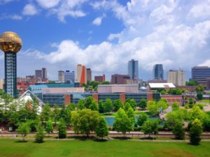City of Knoxville skyline with World's Fair Park in the foreground.