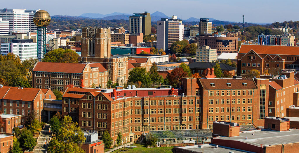 An overview of Hesler Biology Building and Greenhouse, Ayres Hall and downtown Knoxville.