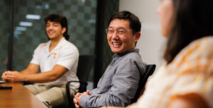 Charles Liu, associate professor of business analytics and statistics, leads a research session with his students in Stokely Management Center at the University of Tennessee.