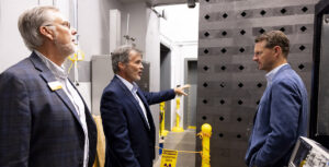 J. Wesley Hines, Postelle Professor and Chancellor's Professor, speaks with Tennessee Department of Economic and Community Development Commissioner Stuart C. McWhorter while taking a tour of the Zeanah Engineering Complex and Department of Nuclear Engineering at the University of Tennessee.
