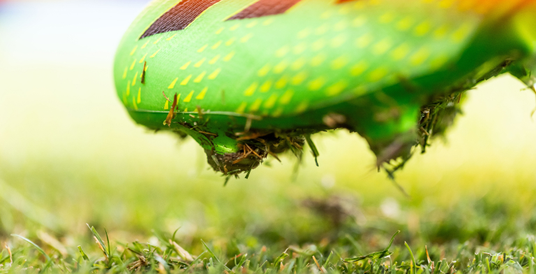 Photo of a cleat attached to the fLEX Device is used to test a turfgrass surface.