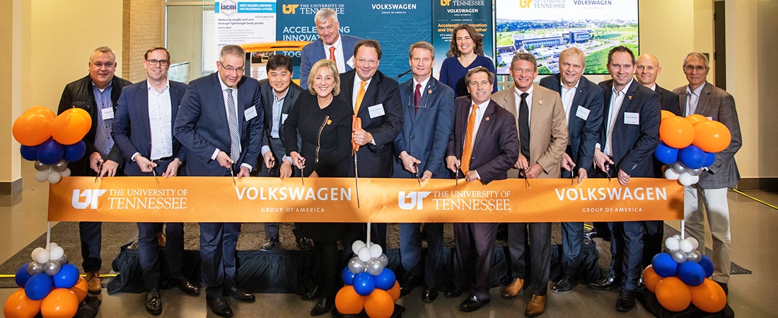 Ribbon cutting during an announcement ceremony of a research partnership between the University of Tennessee and Volkswagen at Cherokee Research Park