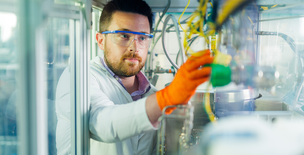 PhD student Conner Pope prepares a CO2-to-jet fuel reactor for an experiment in the Bioenergy and Biofuels Lab.