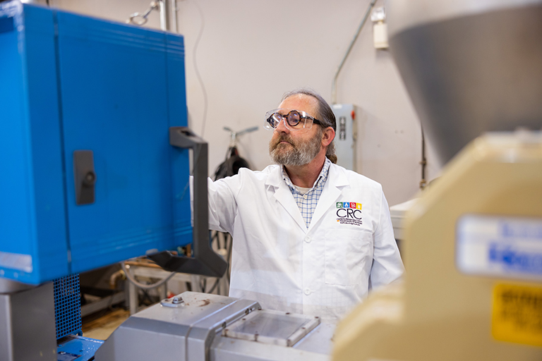 David Harper works in a lab in the Center for Renewable Carbon.