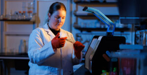 Natalie Gosnell works in an Orion Therapeutics pharmaceuticals lab in the Institute for Advanced Materials and Manufacturing at the University of Tennessee.