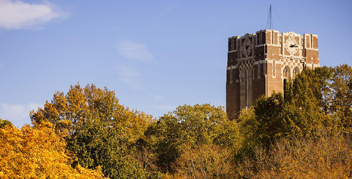 The tower of Ayres Hall at the University of Tennessee, Knoxville, with fall trees