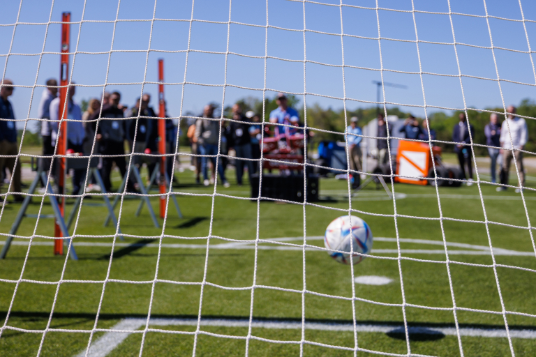 Research Associate Kyley Dickson and Taylor Williams gives presentation on the shallow pitch profile and the fLEX Device during the FIFA Field Day and Club World Cup Workshop.