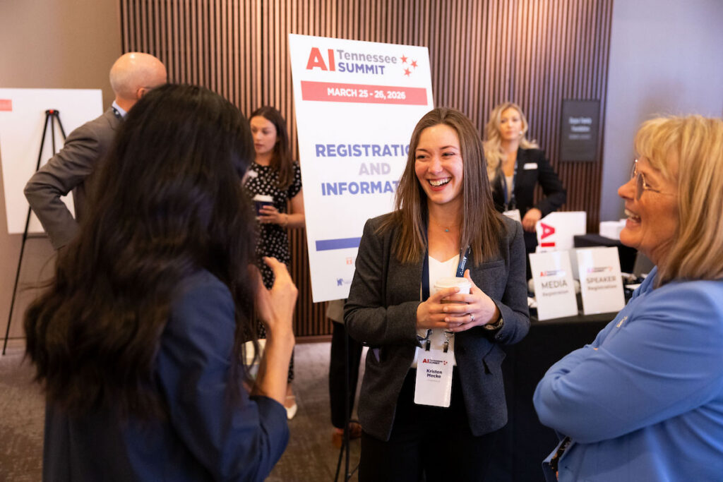 Attendees mingle during the AI Tennessee Summit at the Country Music Hall of Fame in Nashville, TN.